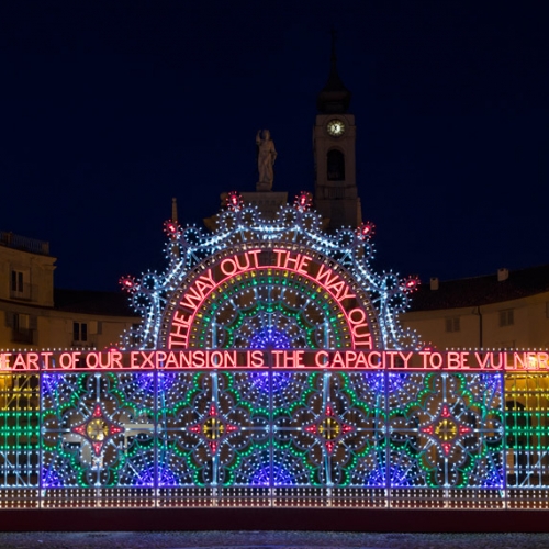 Marinella Senatore, Assembly, 2021 LED bulbs and mixed media on wooden and metal structure, in Piazza dell'Annunziata, Venaria Reale, 2022