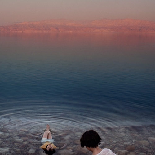 Palestinian girls floating on the waters of the Dead Sea. West Bank, 2009. ©Paolo Pellegrin/Magnum Photos